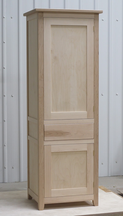 Small larder cupboard before painting. Solid maple carcass construction with birch ply panels and shelves. Oak dovetailed drawers and oak cornice.